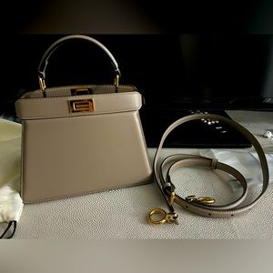 Totally brand new, NEVER WORN Fendi peek-a-boo with tortoise detail. Rare find!